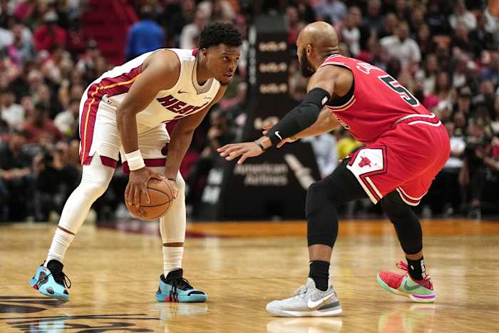 Chicago Bulls guard Jevon Carter (5) defends Miami Heat guard Kyle Lowry (7) during the second half at Kaseya Center.